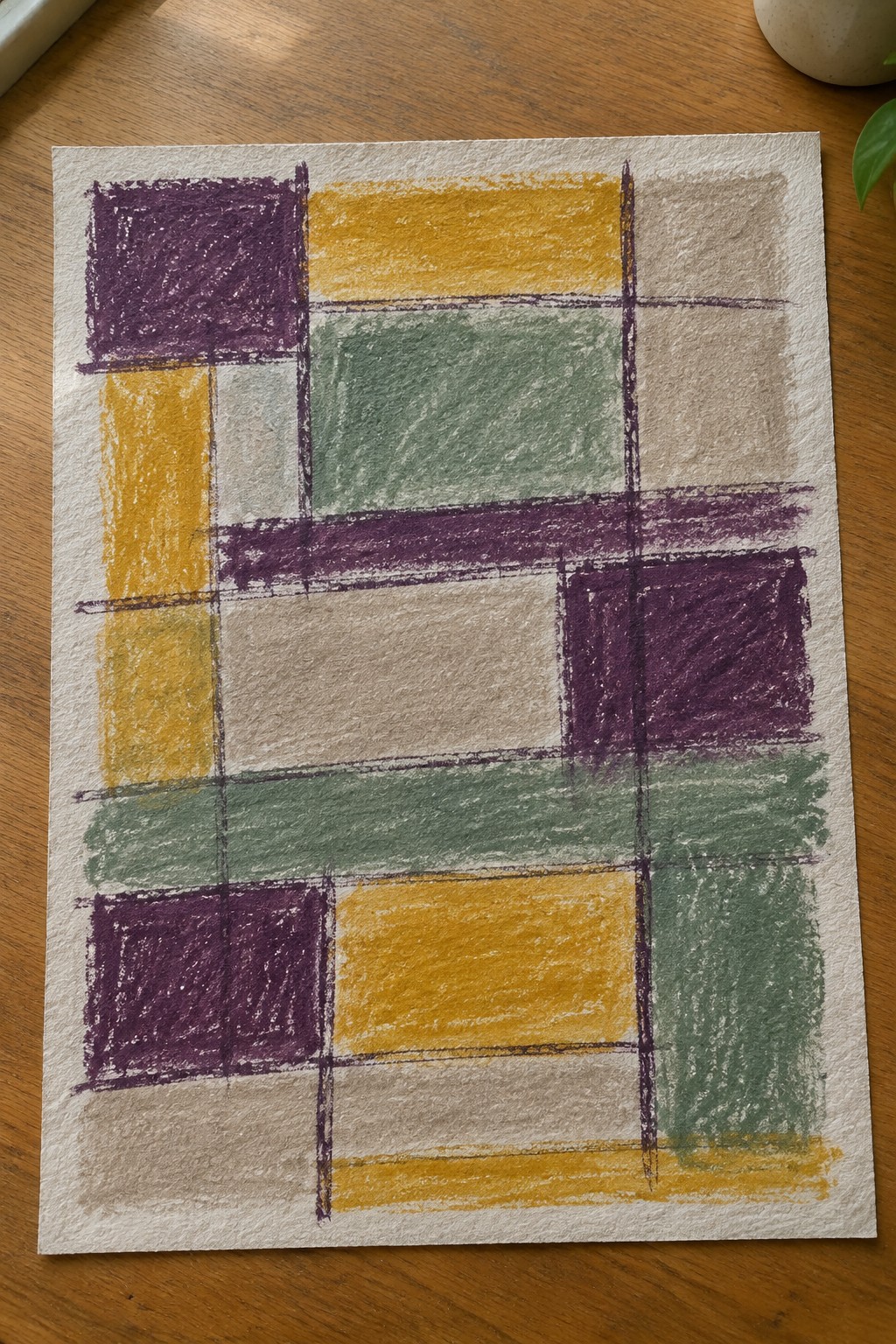 Abstract geometric artwork with purple, yellow, green, and beige rectangles on white paper.
