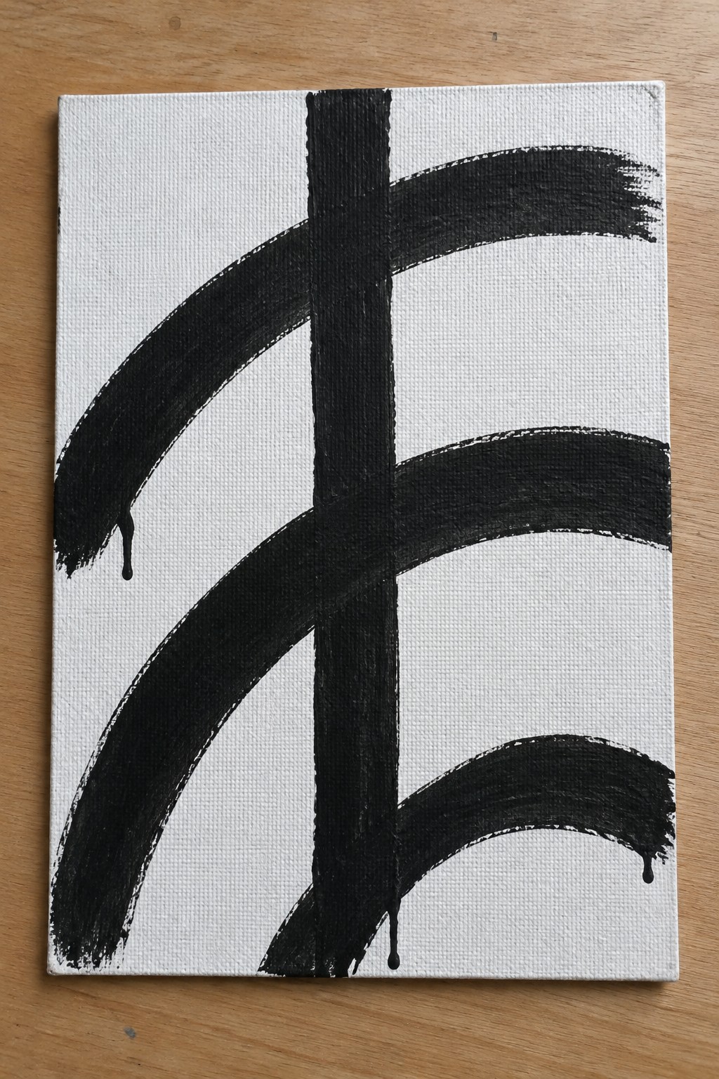 Abstract black and white canvas with central vertical stripe and curved brushstrokes with drips