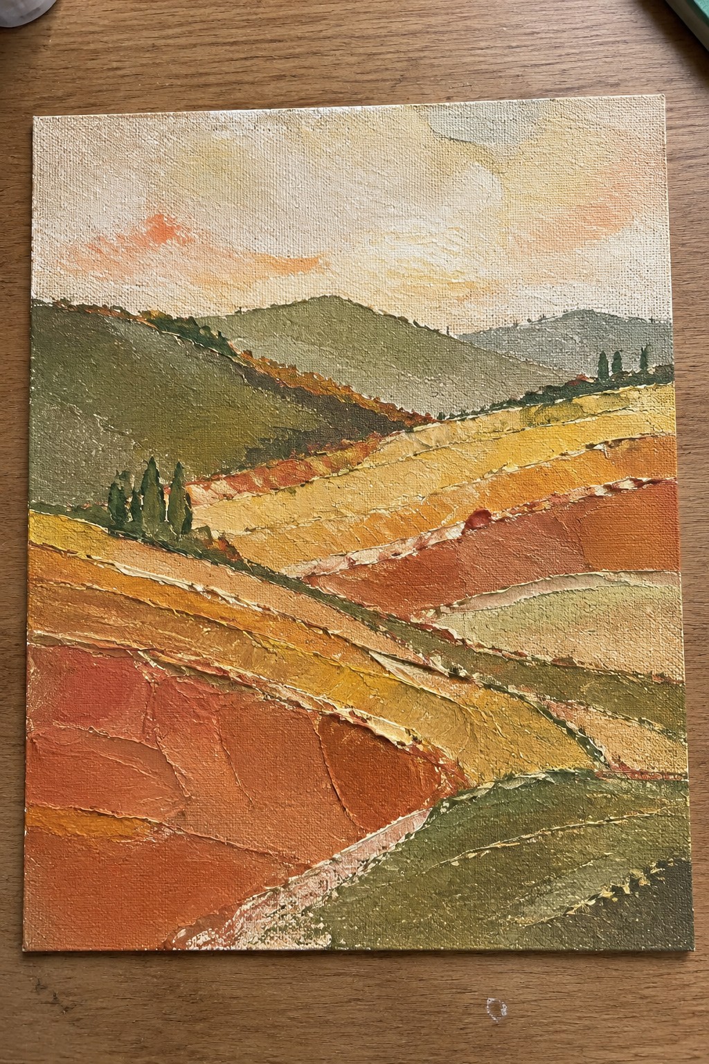 Textured oil painting of rolling autumn hills with cypress trees under a warm sky.