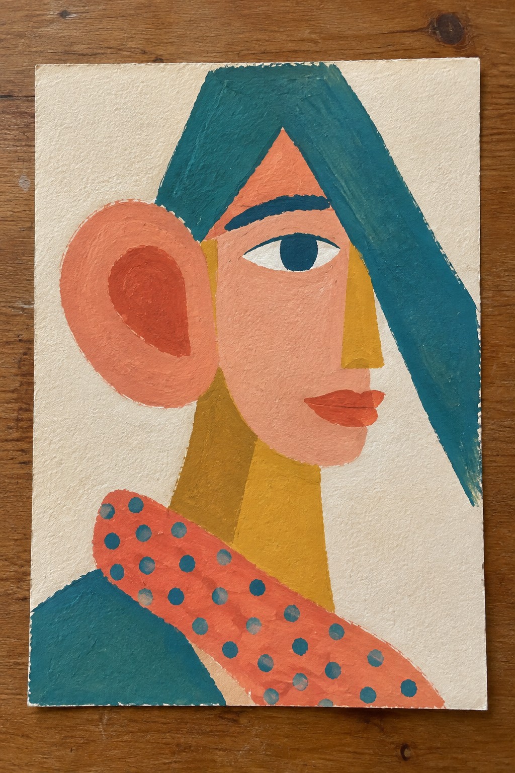 Abstract portrait of woman with teal hair, orange face, and polka-dotted scarf