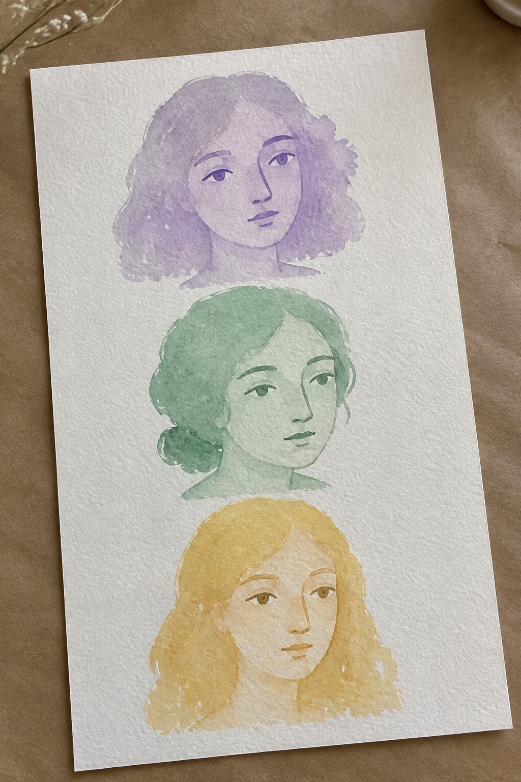 Three stacked watercolor portraits of women with purple, green, and yellow curly hair.