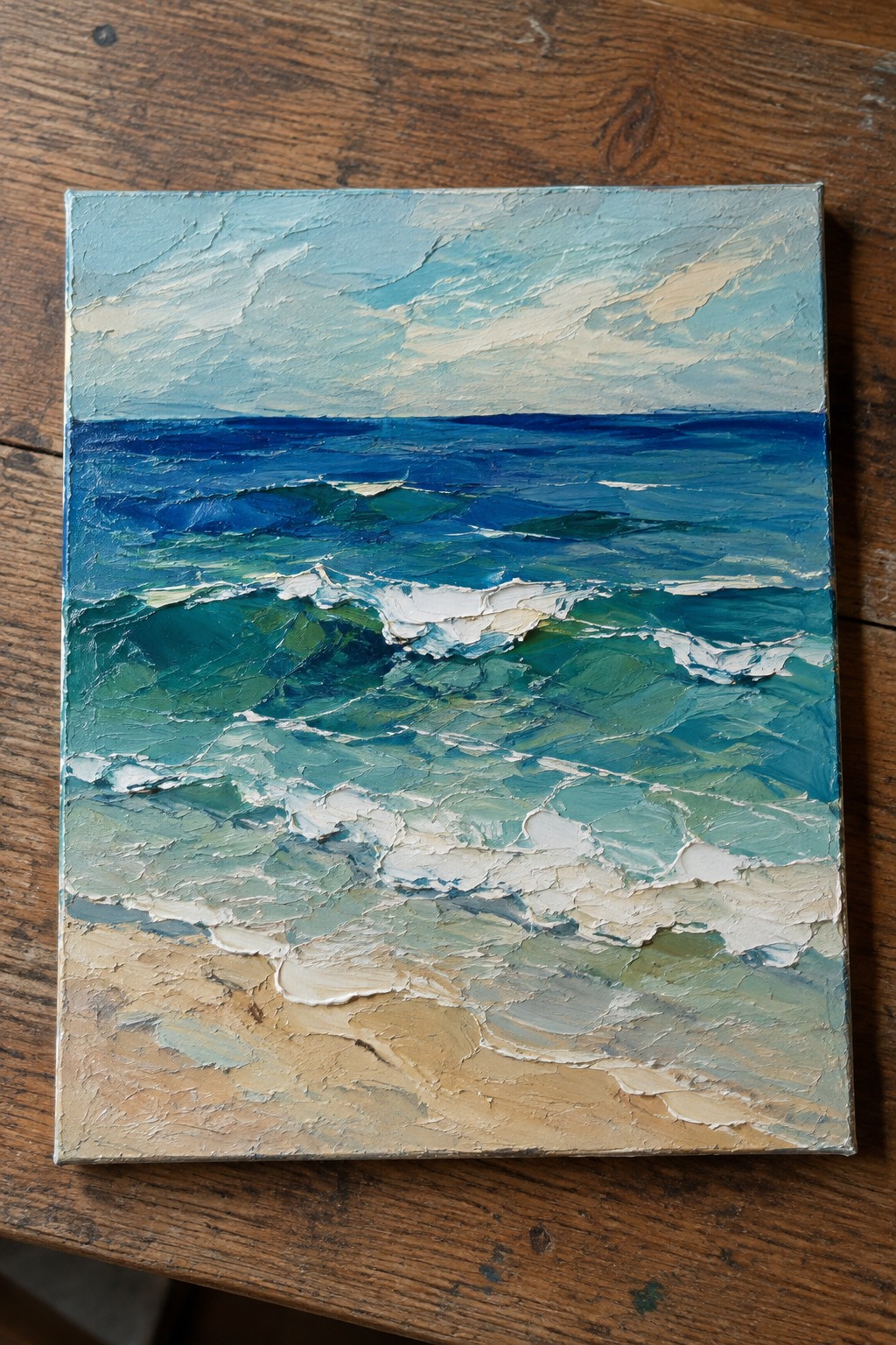 Impasto painting of blue-green ocean waves crashing on sandy beach under sky