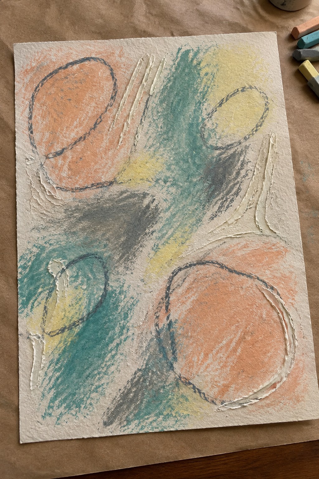 Abstract pastel artwork with overlapping orange circles, teal scribbles, and textured white lines.