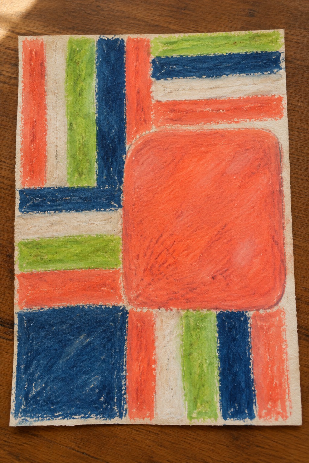 Abstract artwork with red, blue, green, and white geometric shapes on textured paper.